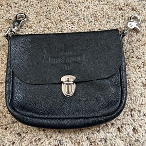 Harley Davidson small purse. Like new one scratch as seen in photo. 7 1/2 x 6